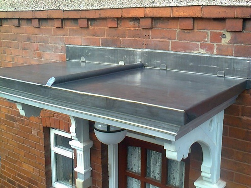 Lead work on a bay window roof
