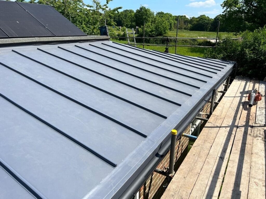 Single ply flat roof system installation