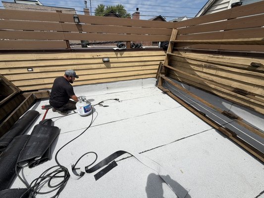 Flat roof felt system being installed